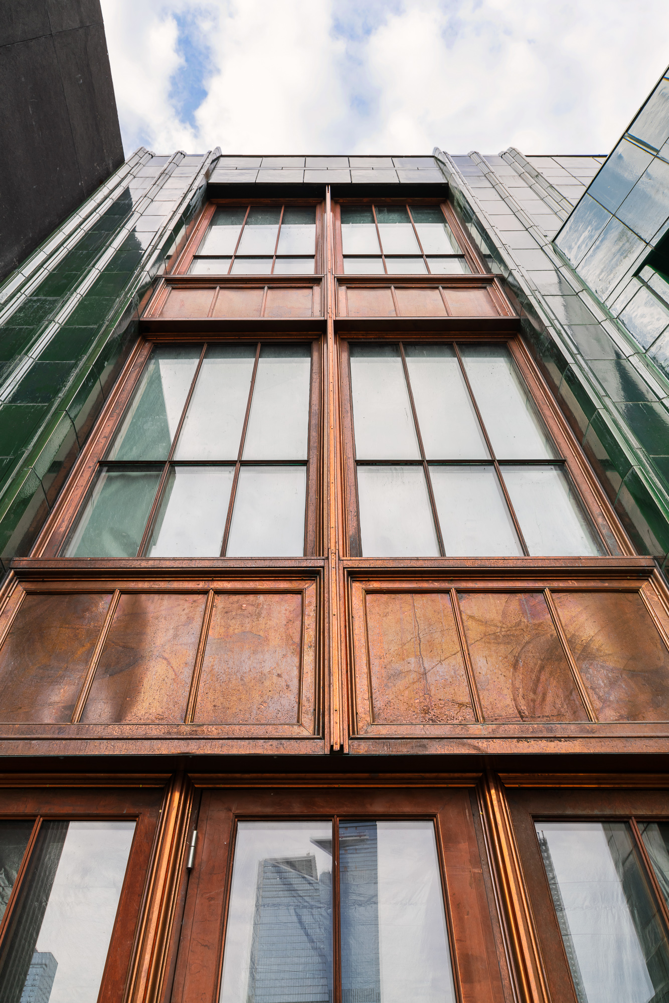 Building with copper metal moulding